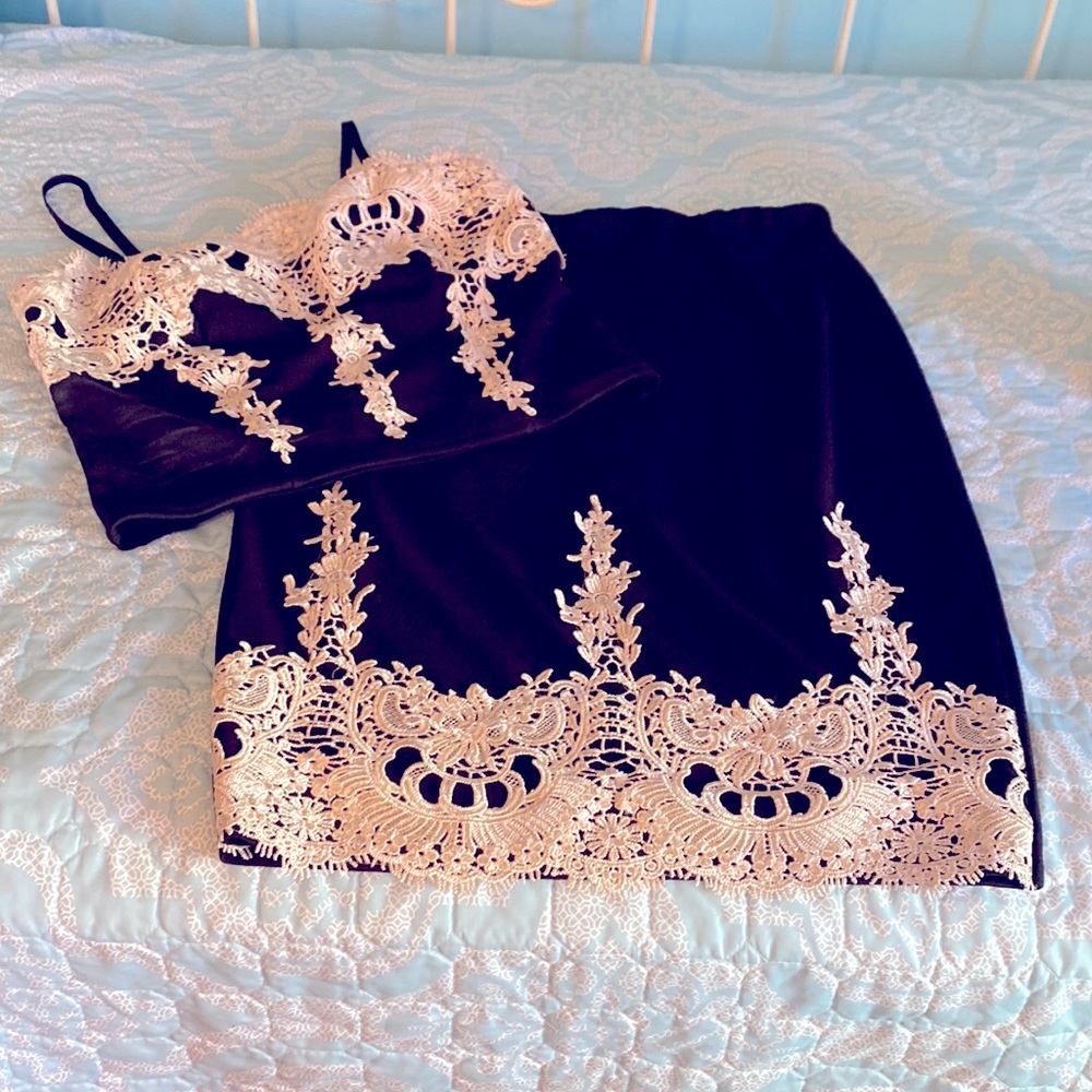 Black with white lace accents size large skirt and top